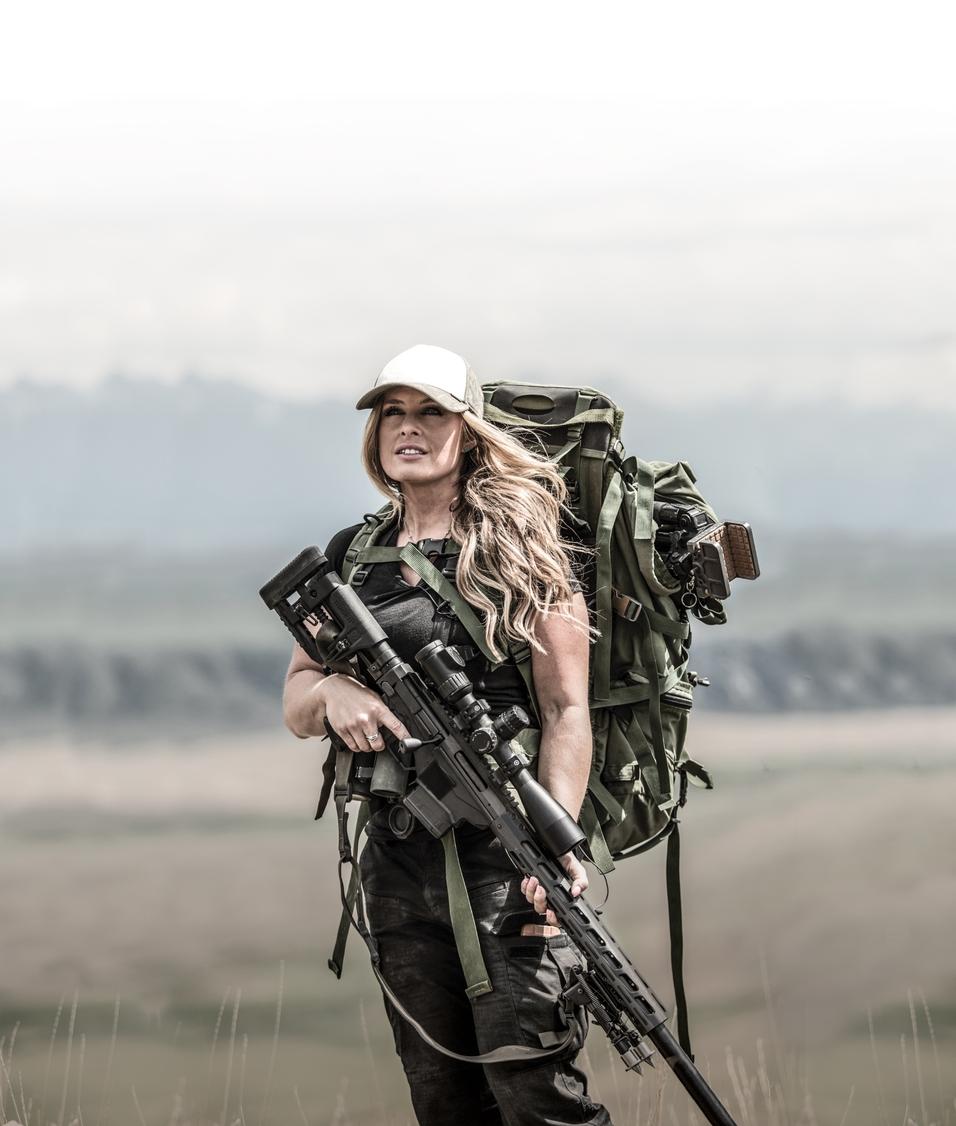 MAN HUNTING WITH GUN